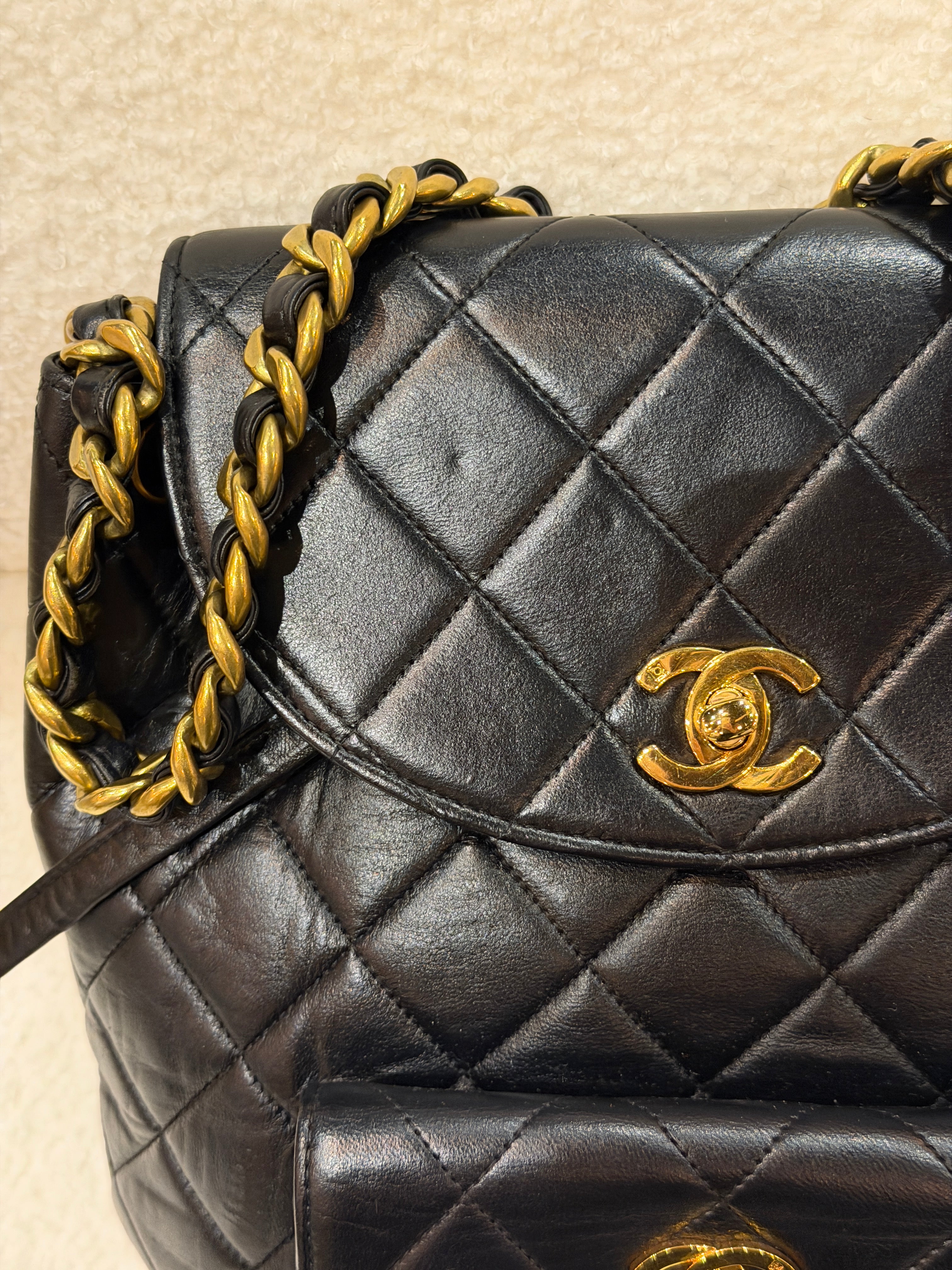 CHANEL Vintage Black Lambskin Quilted Drawstring Backpack 24K Gold Plated Hardware