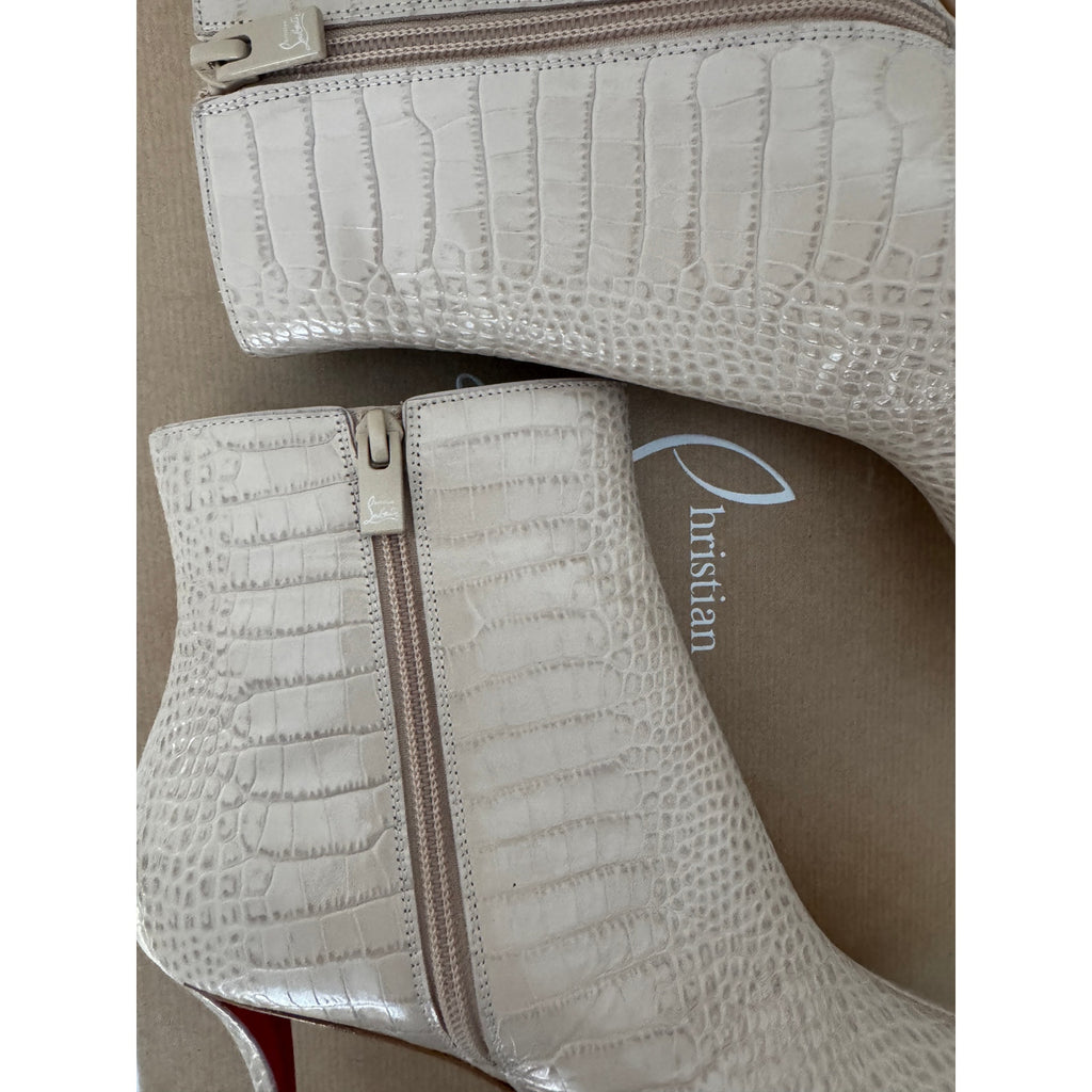 CHRISTIAN LOUBOUTIN
Snake-effect leather ankle boots BNIB 39.5