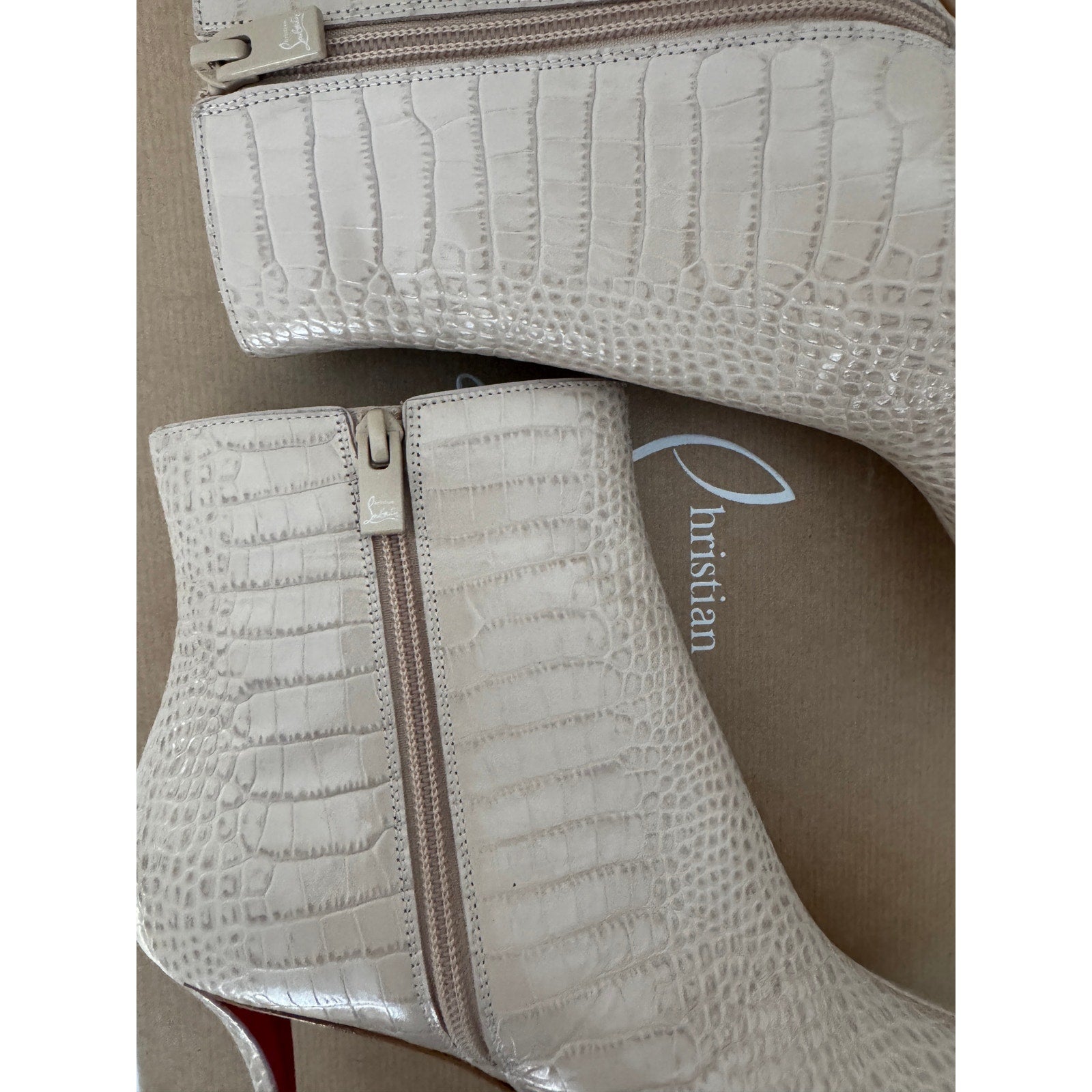 CHRISTIAN LOUBOUTIN
Snake-effect leather ankle boots BNIB 39.5