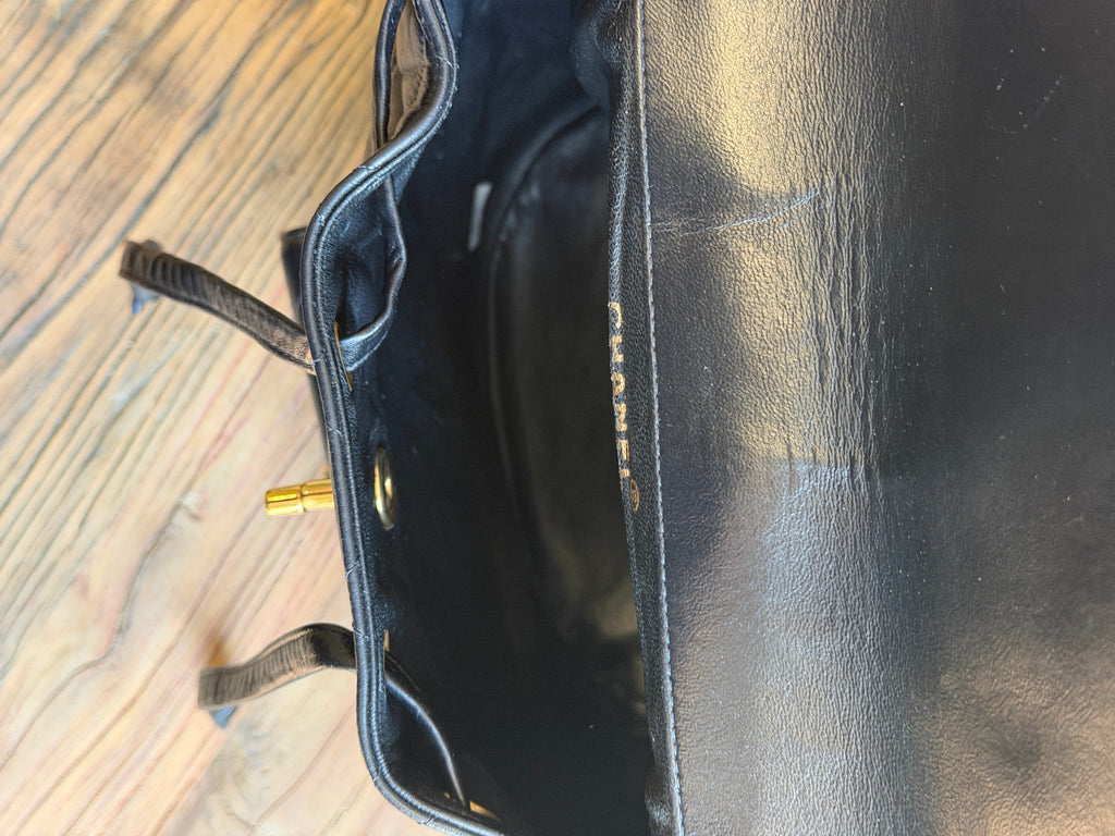 CHANEL Vintage Black Lambskin Quilted Drawstring Backpack 24K Gold Plated Hardware