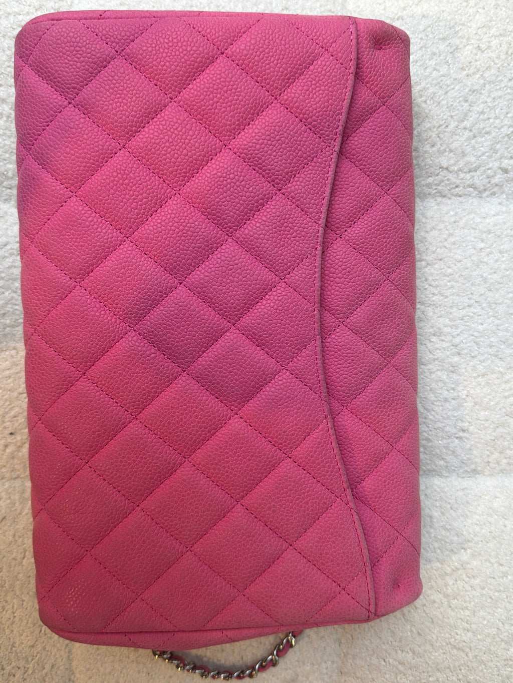 Chanel Pink caviar clutch on a chain