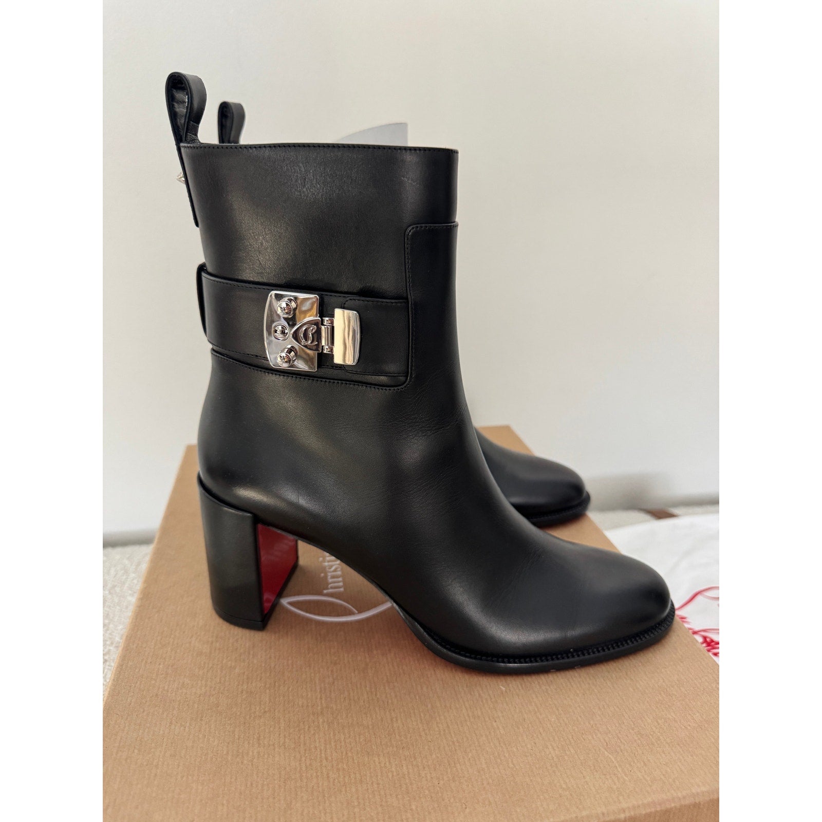 CHRISTIAN LOUBOUTIN
Booty Lock 70 leather ankle boots Size 40