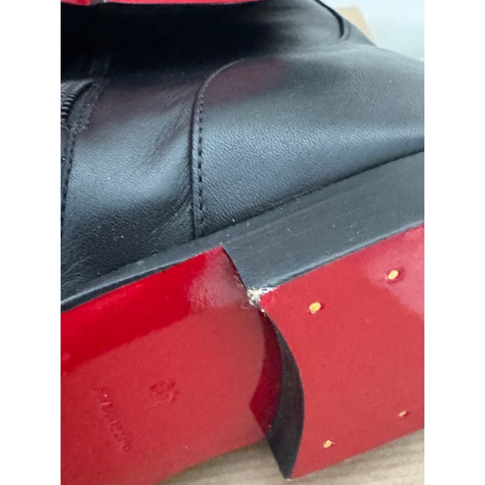 CHRISTIAN LOUBOUTIN 
Chain Detail Apron Toe Bootie 40 BNIB