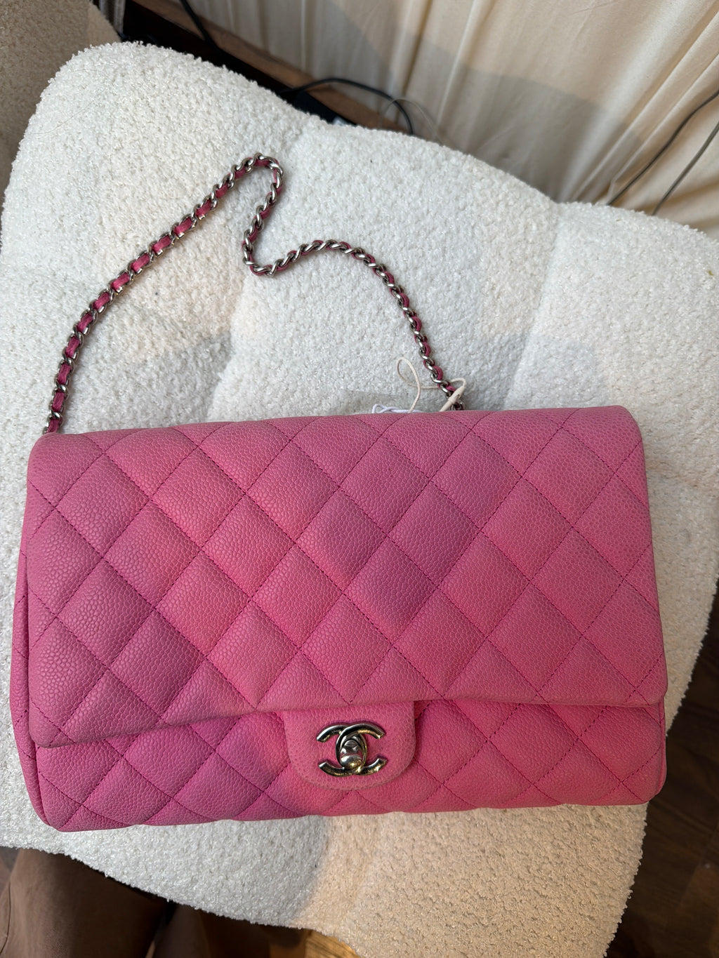 Chanel Pink caviar clutch on a chain