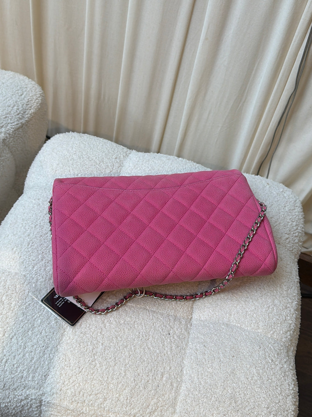 Chanel Pink caviar clutch on a chain