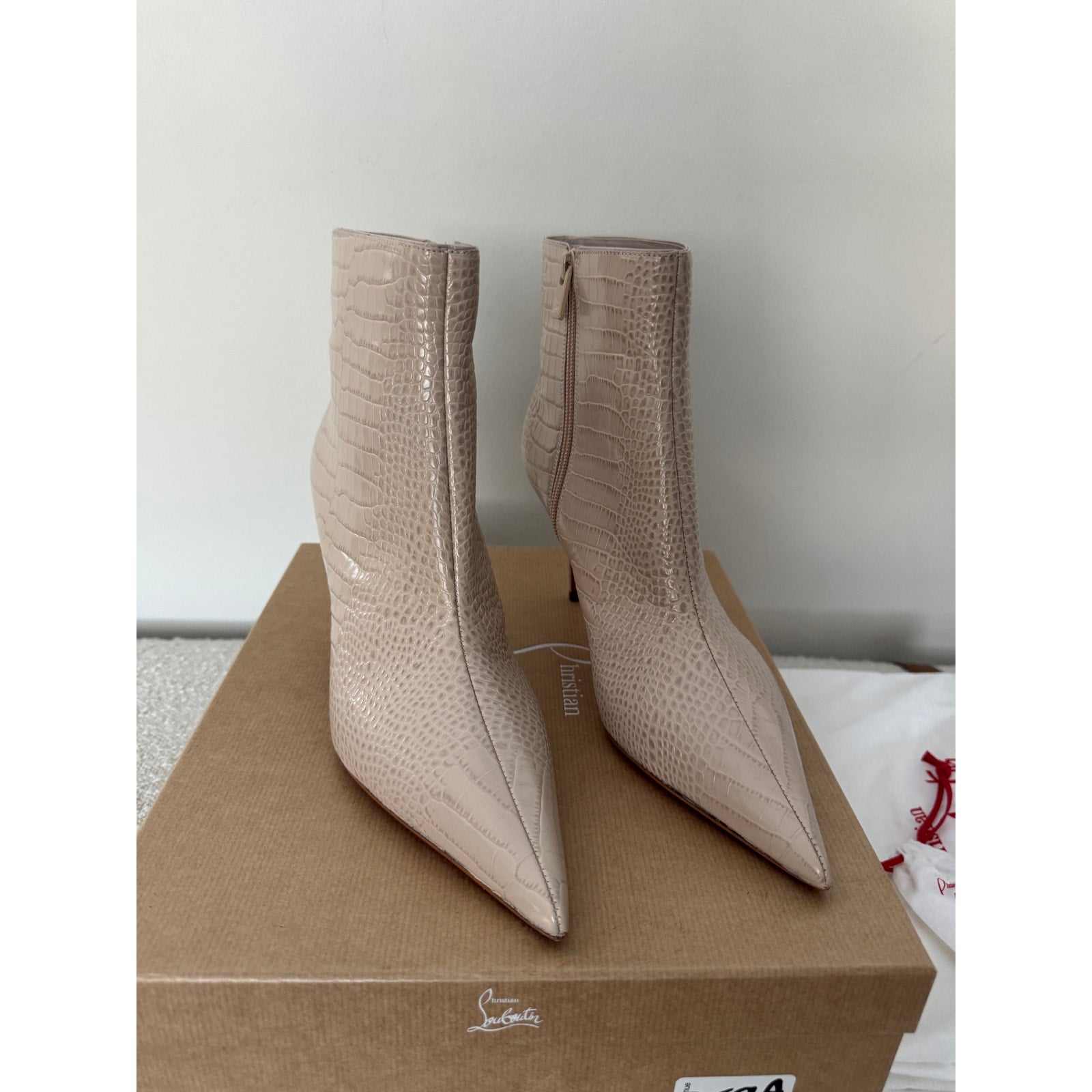 CHRISTIAN LOUBOUTIN
Snake-effect leather ankle boots BNIB 39.5