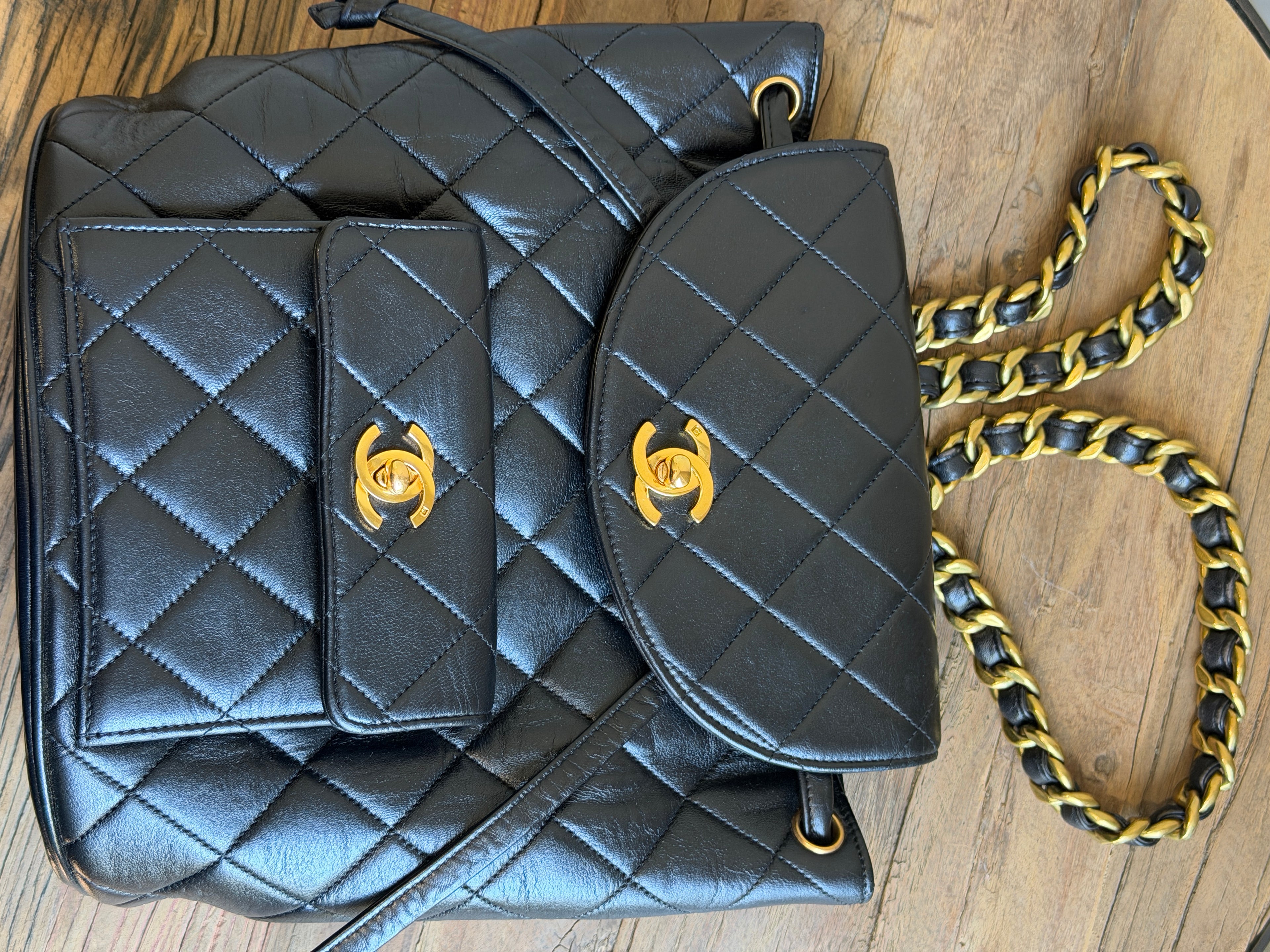 CHANEL Vintage Black Lambskin Quilted Drawstring Backpack 24K Gold Plated Hardware