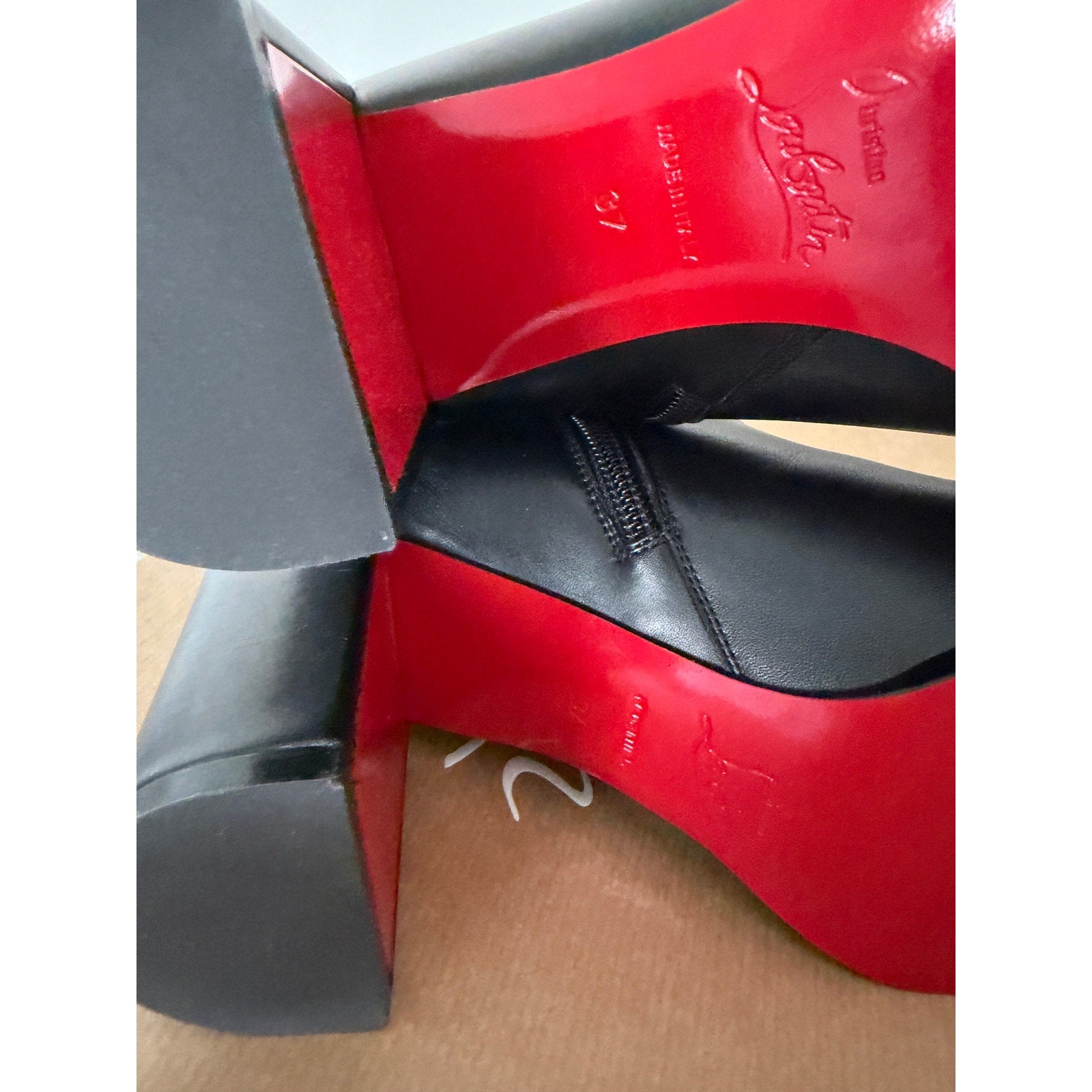 CHRISTIAN LOUBOUTIN
Booty Lock 70 leather ankle boots Size 37 NWT