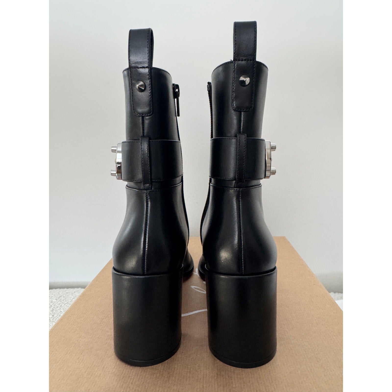 CHRISTIAN LOUBOUTIN
Booty Lock 70 leather ankle boots Size 40