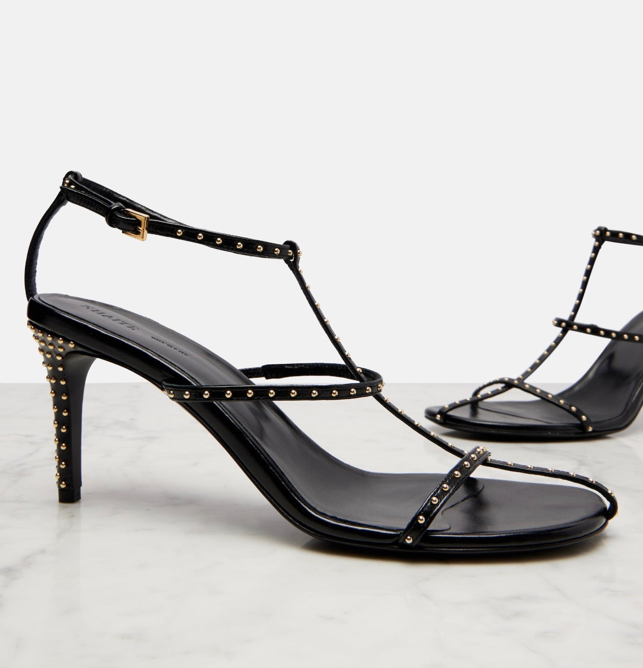 Khaite
Cage studded leather sandals 38