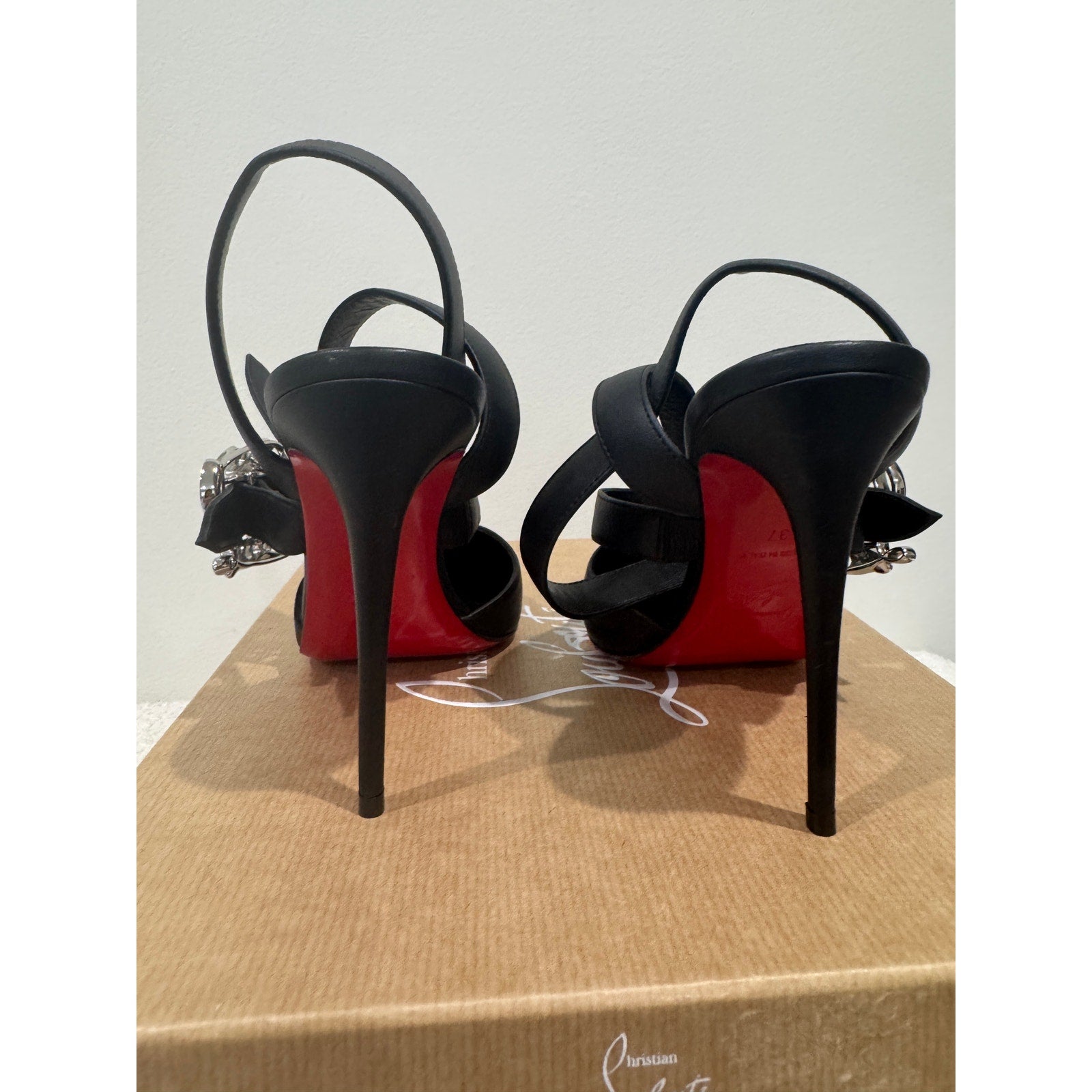 CHRISTIAN LOUBOUTIN 37 Giddylina 100 buckle-embellished leather pumps$1,495