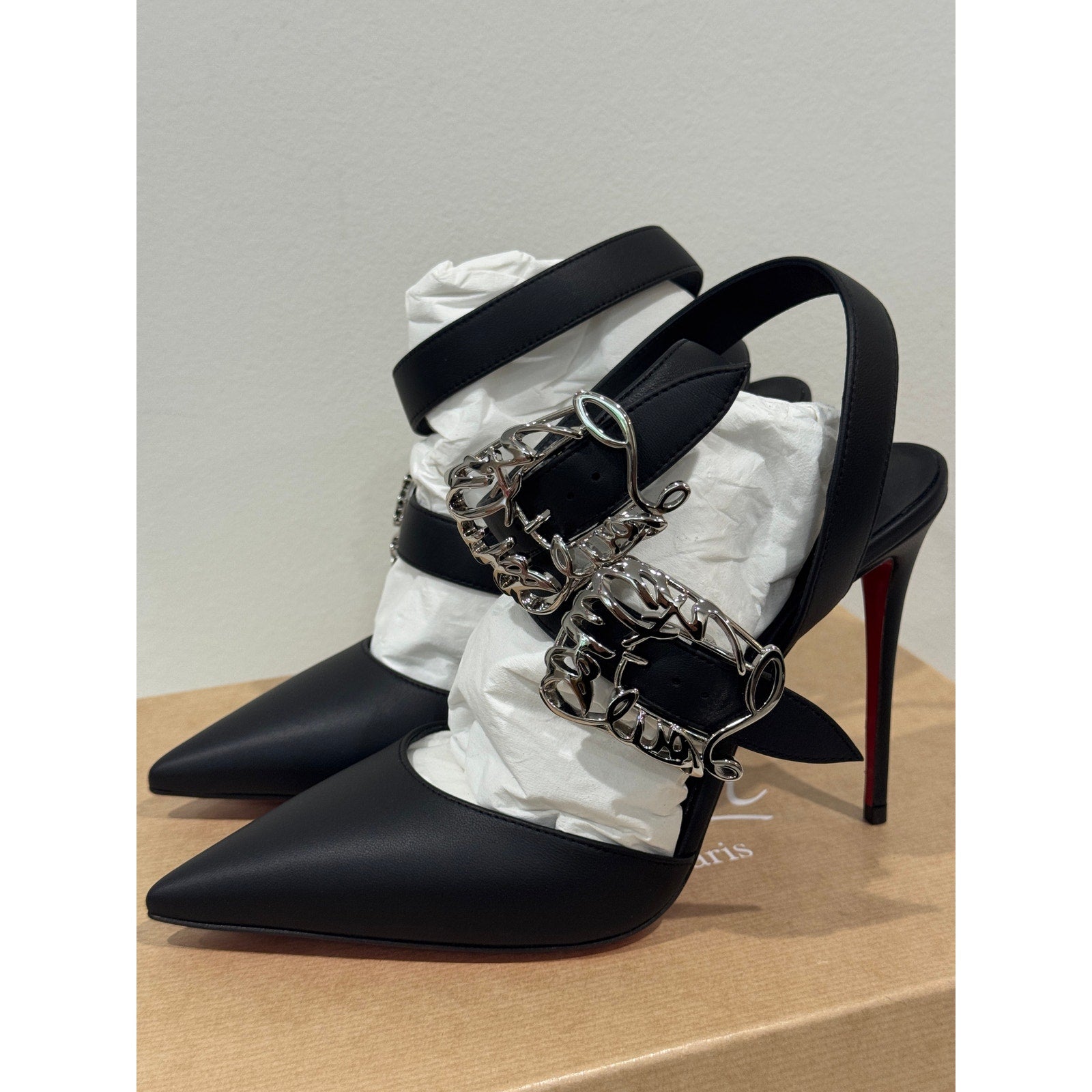 CHRISTIAN LOUBOUTIN 38 Giddylina 100 buckle-embellished leather pumps$1,495
