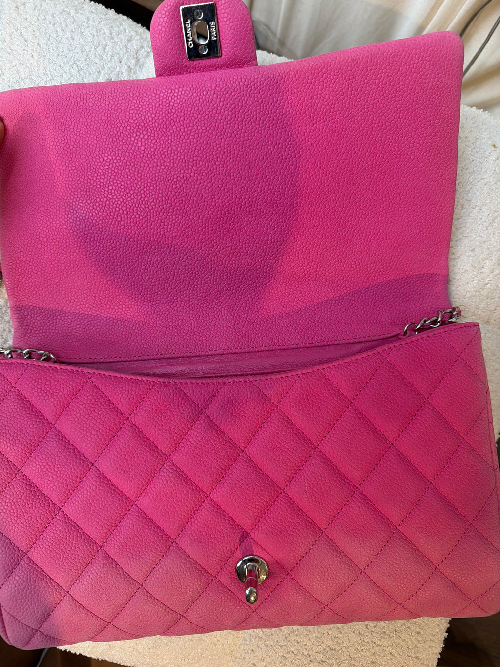 Chanel Pink caviar clutch on a chain