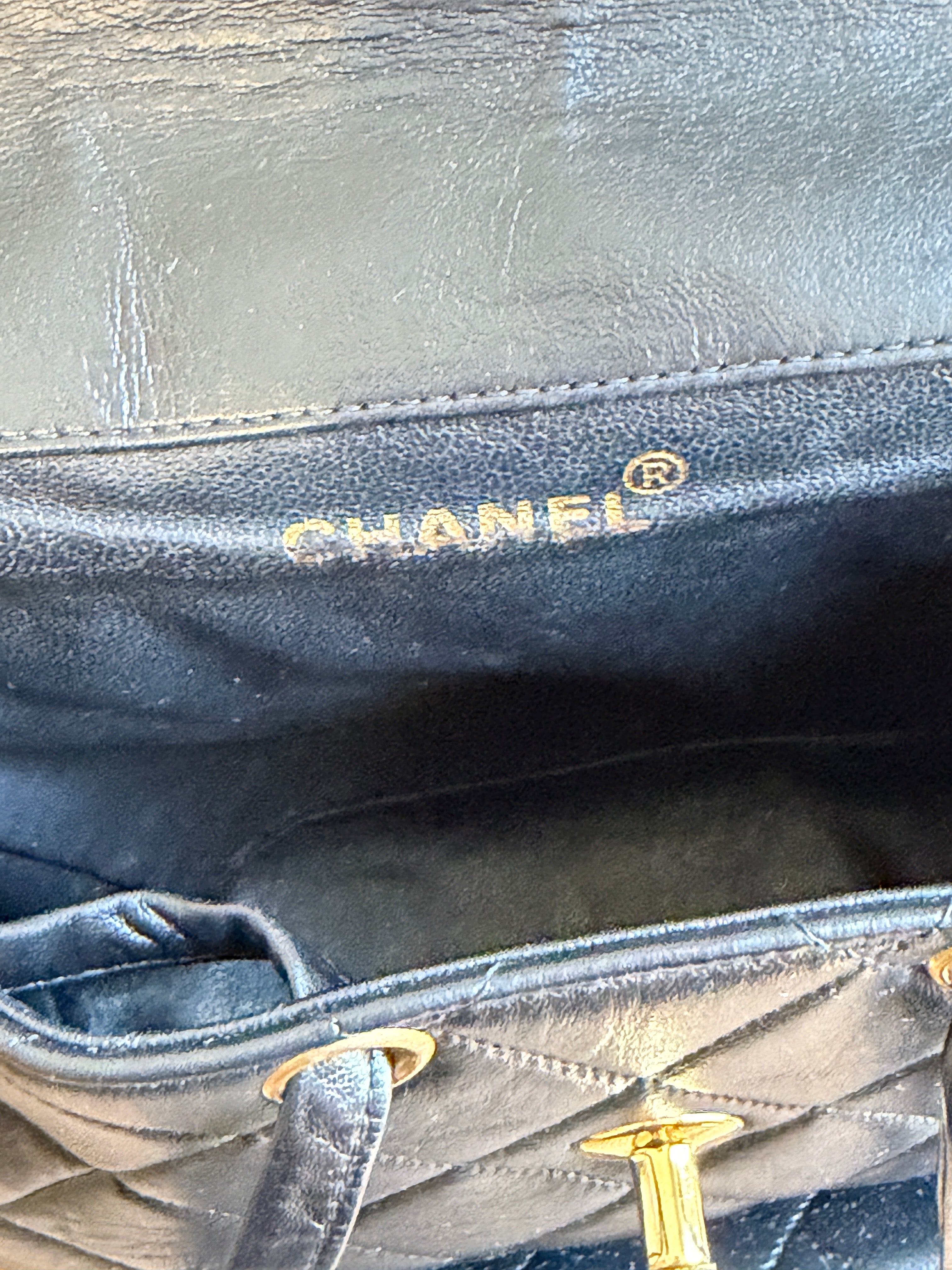 CHANEL Vintage Black Lambskin Quilted Drawstring Backpack 24K Gold Plated Hardware