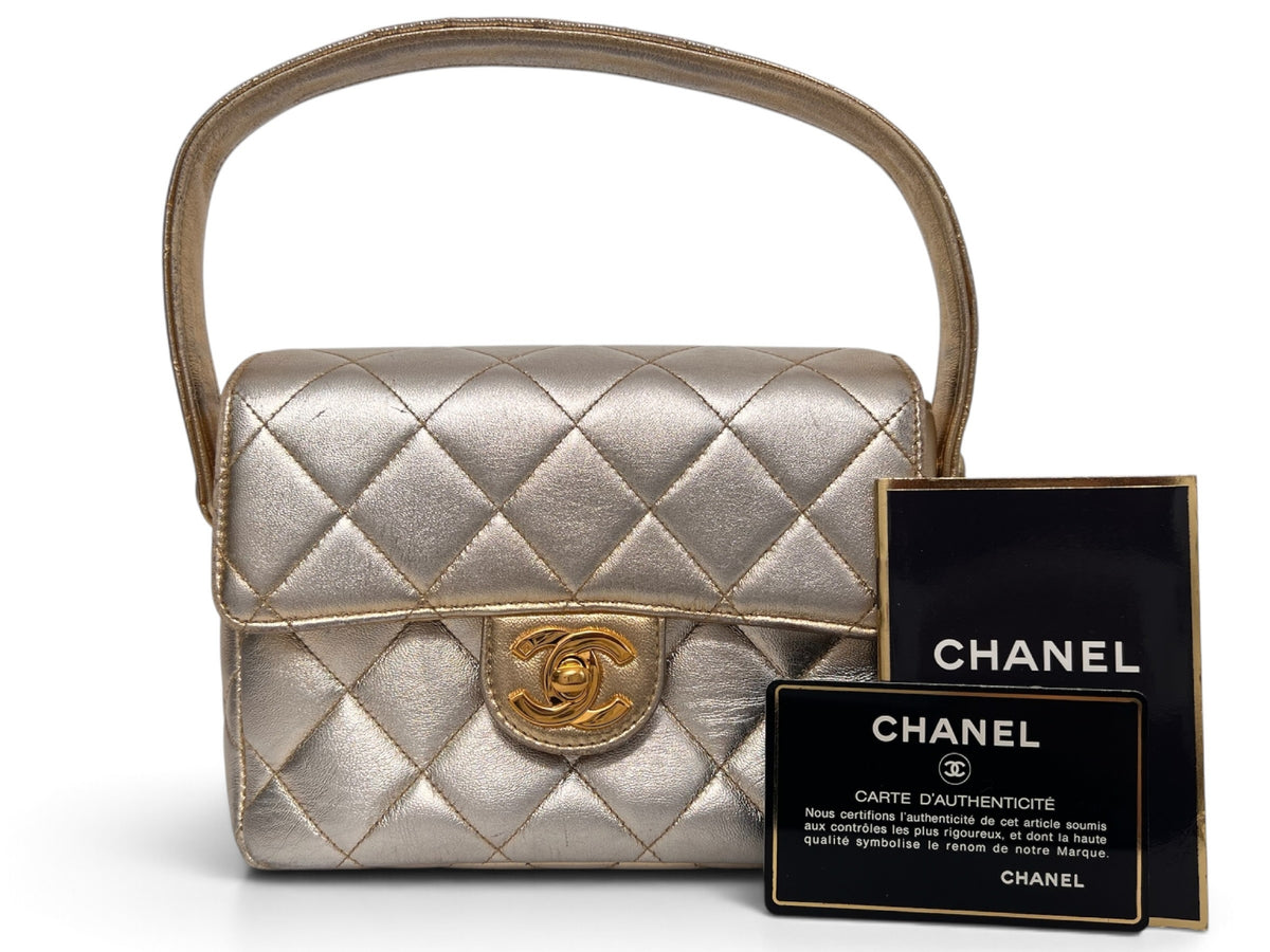 Chanel 1994–1996 Gold Metallic Quilted Matelassé Mini Top Handle Flap Bag