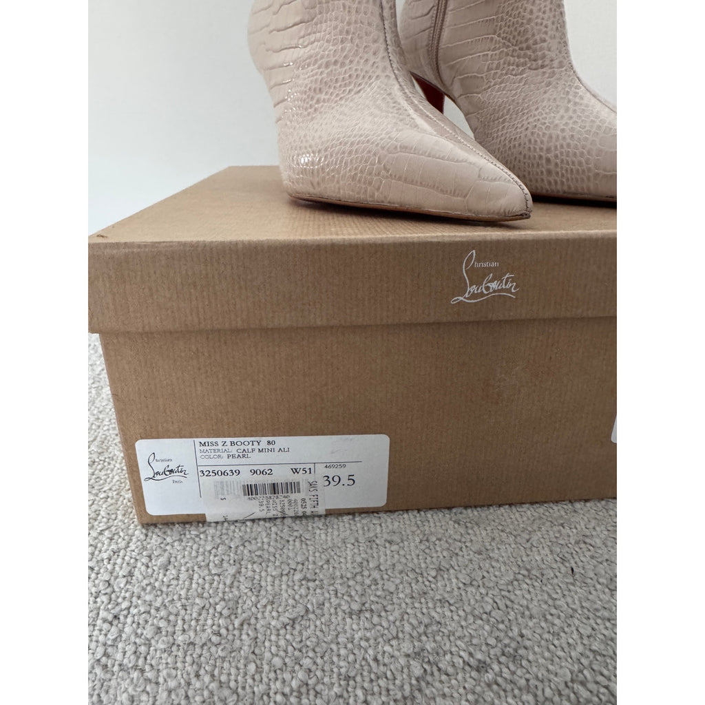 CHRISTIAN LOUBOUTIN
Snake-effect leather ankle boots BNIB 39.5