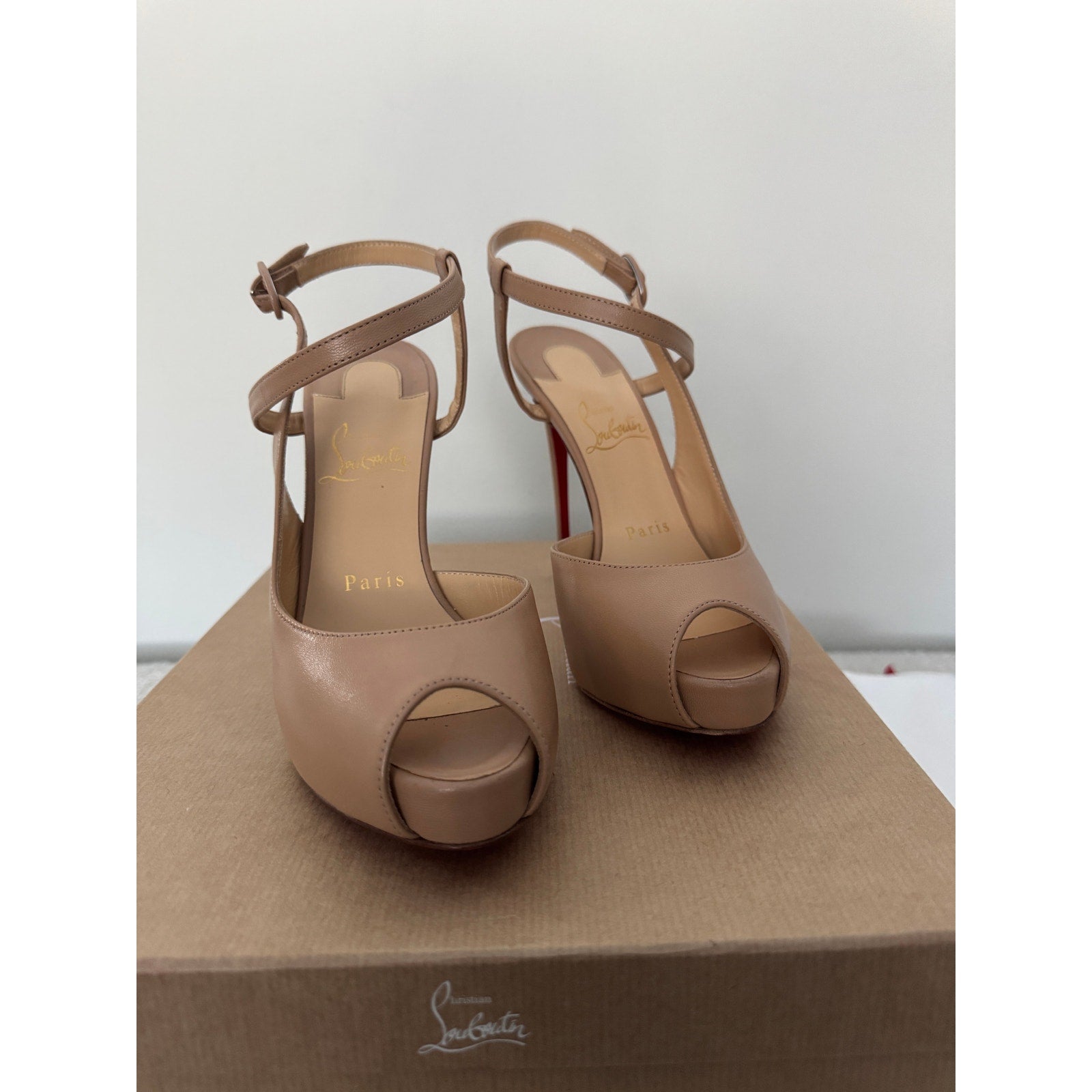 CHRISTIAN LOUBOUTIN 
Jenlove Peep Toe Stiletto Sandals - Nude Size 36.5