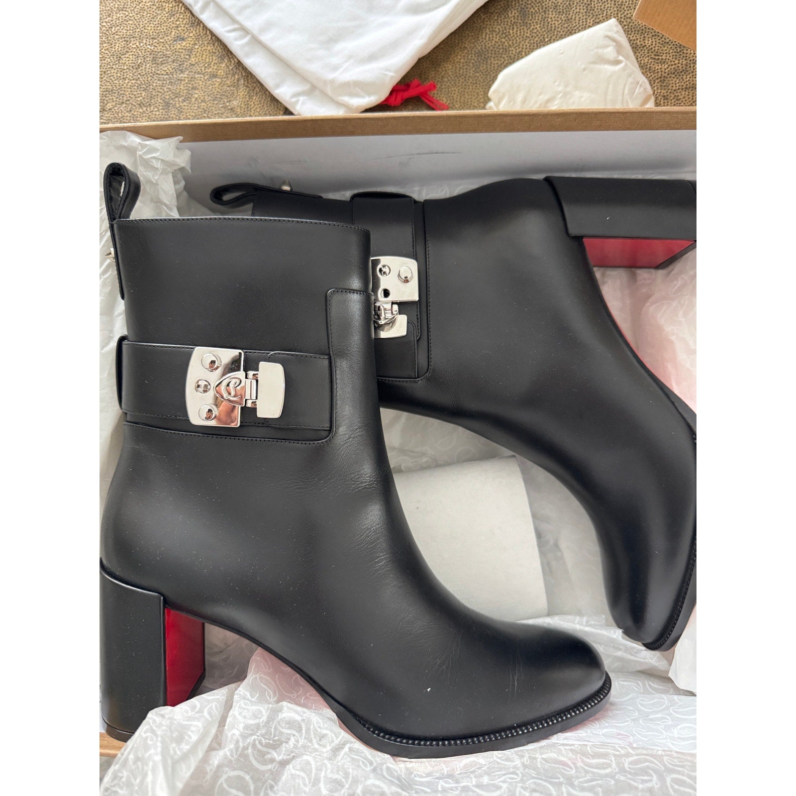 CHRISTIAN LOUBOUTIN
Booty Lock 70 leather ankle boots Size 40