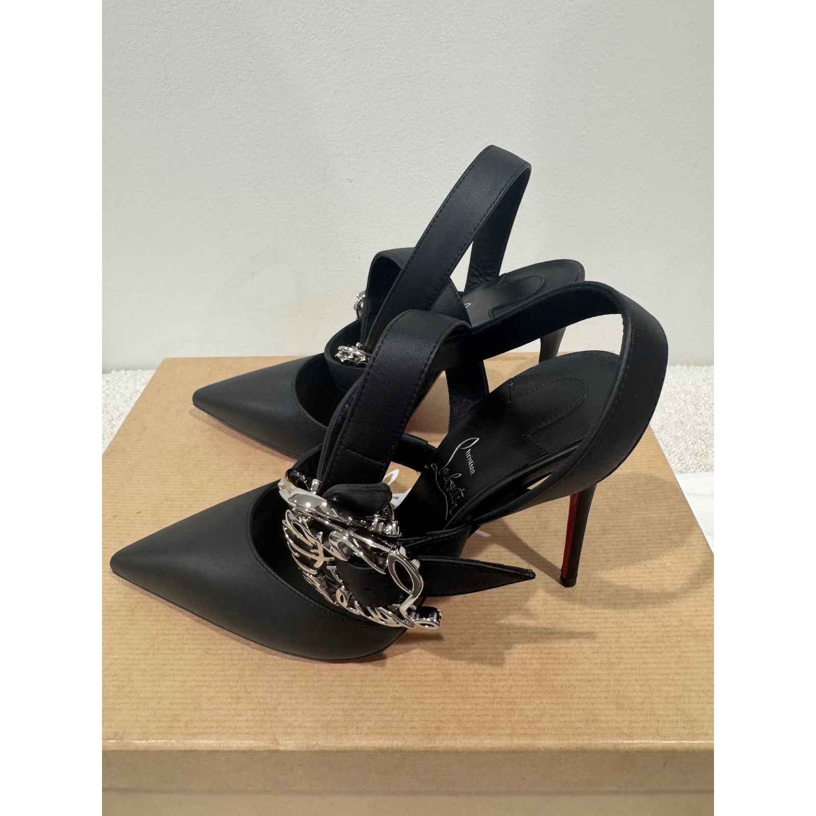 CHRISTIAN LOUBOUTIN 36 Giddylina 100 buckle-embellished leather pumps$1,495