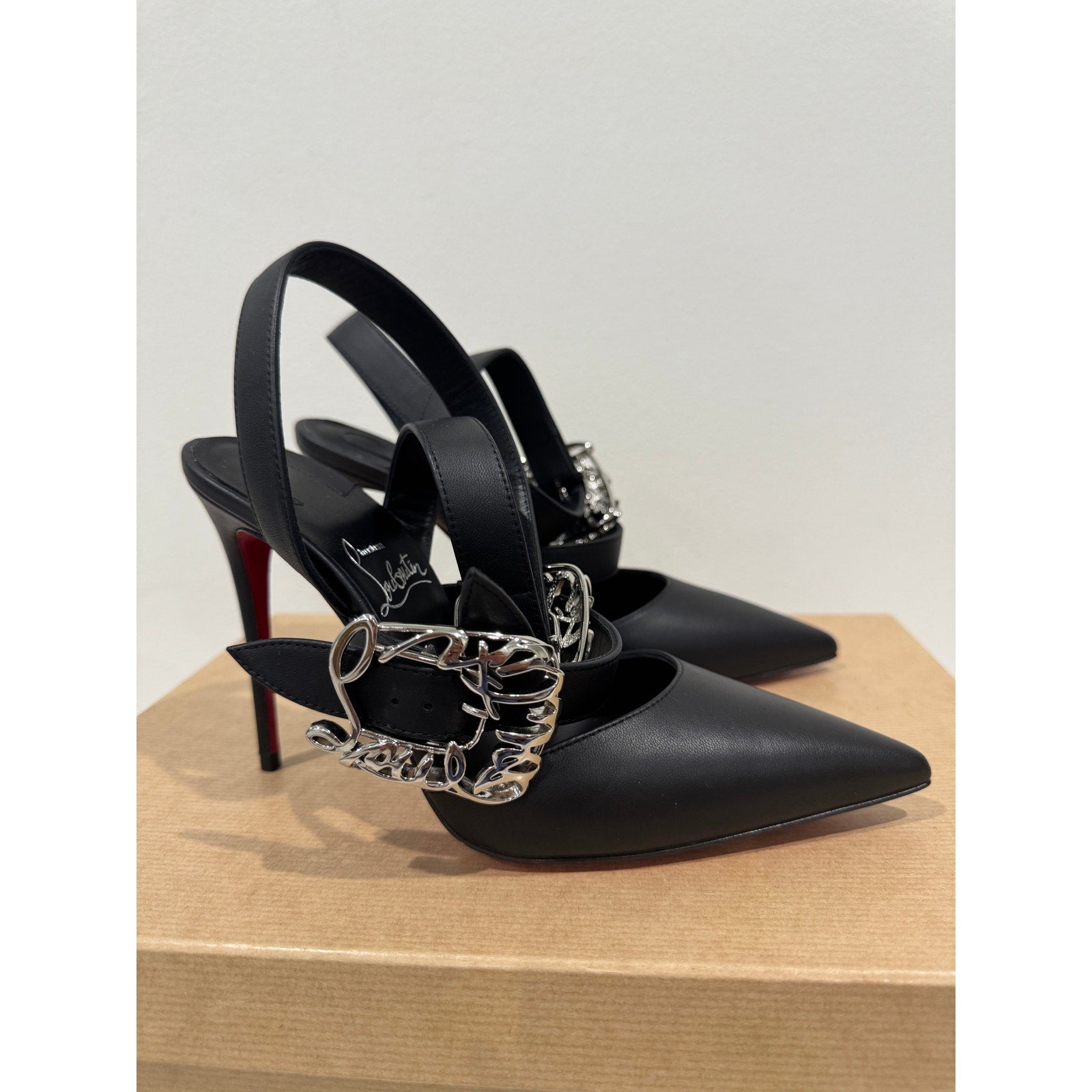 CHRISTIAN LOUBOUTIN 36 Giddylina 100 buckle-embellished leather pumps$1,495
