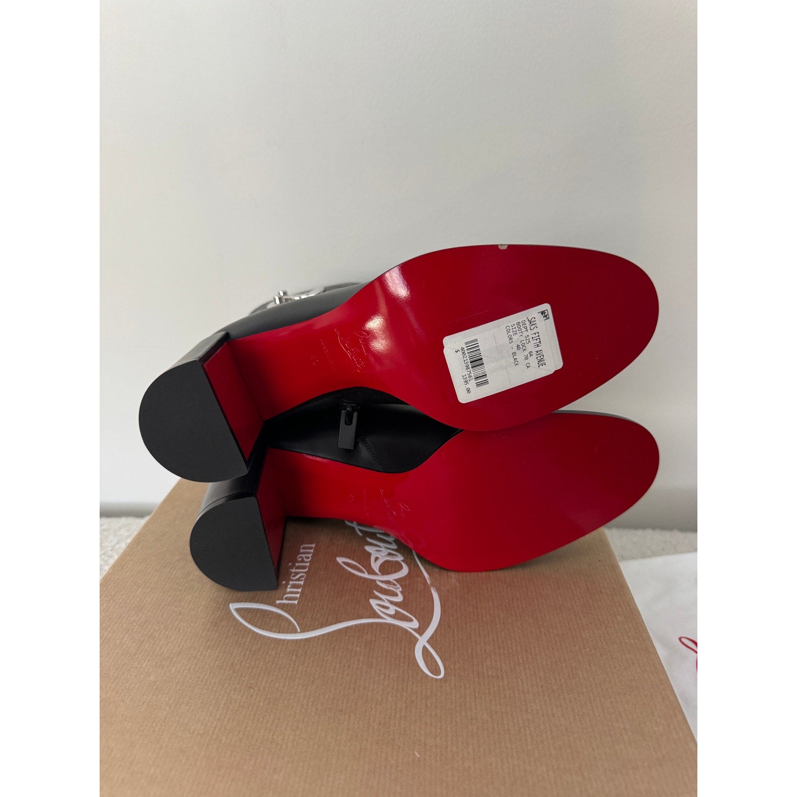 CHRISTIAN LOUBOUTIN
Booty Lock 70 leather ankle boots Size 40