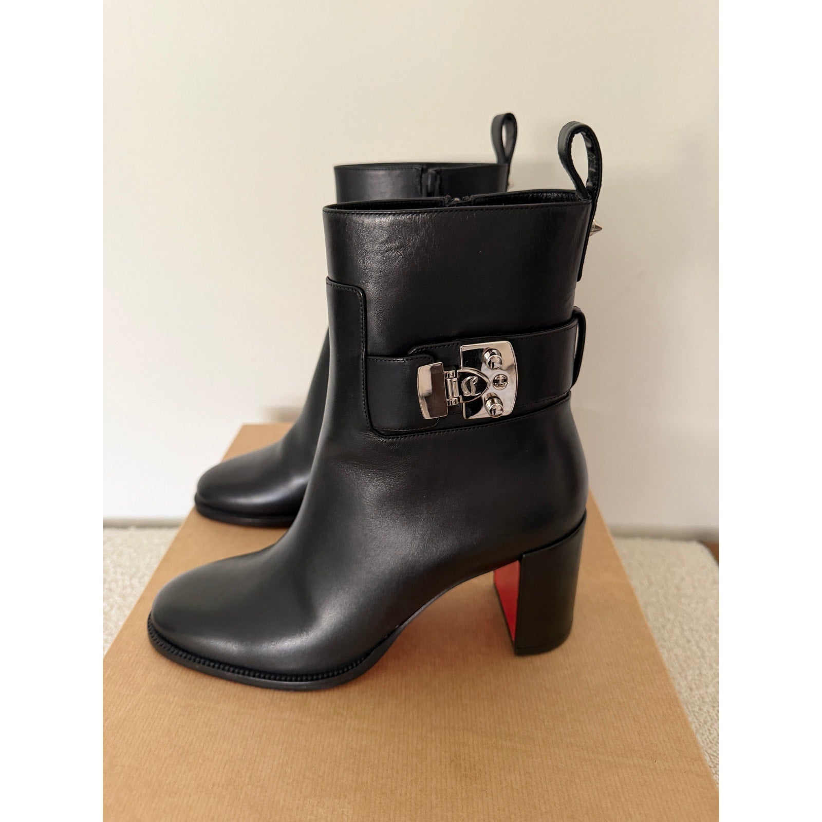 CHRISTIAN LOUBOUTIN
Booty Lock 70 leather ankle boots Size 37 NWT