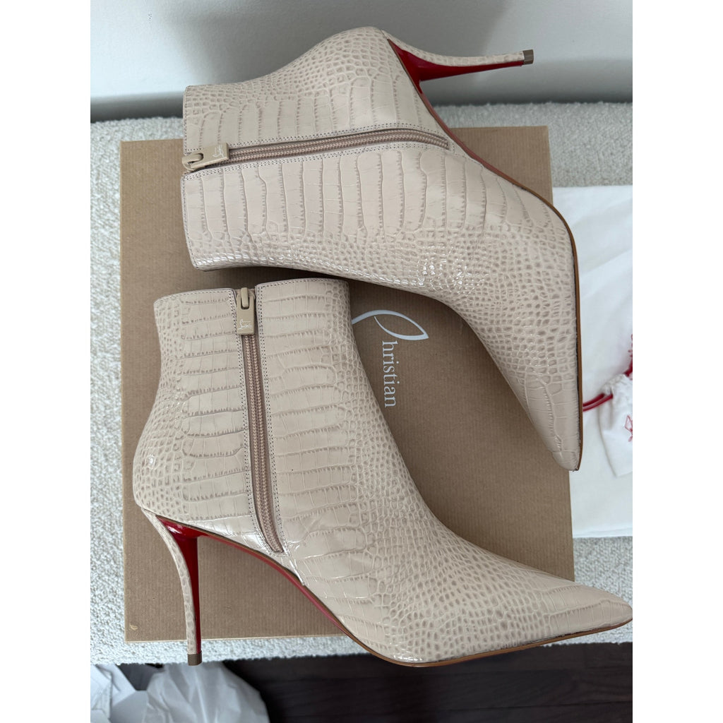 CHRISTIAN LOUBOUTIN
Snake-effect leather ankle boots BNIB 39.5