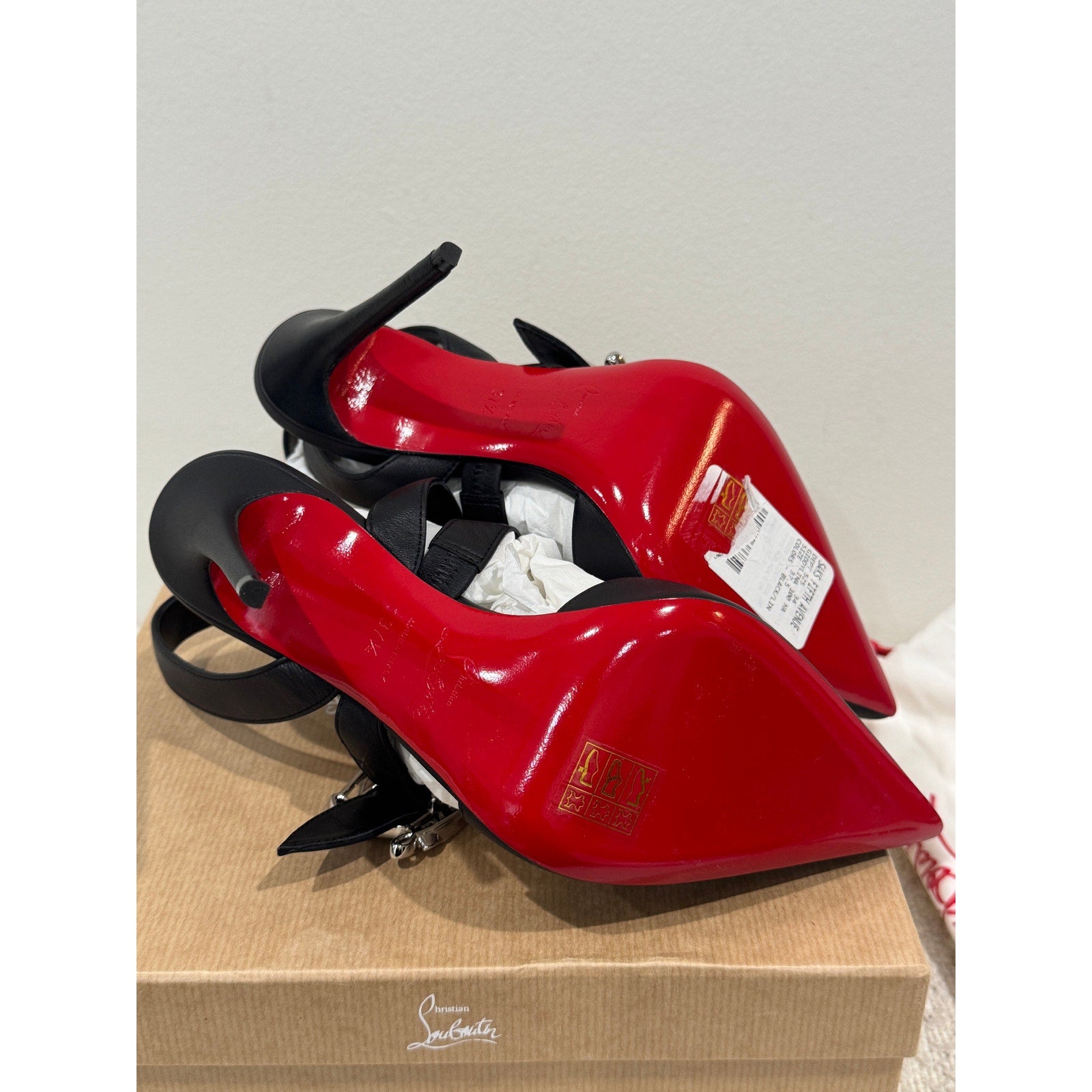 CHRISTIAN LOUBOUTIN 37.5 Giddylina 100 buckle-embellished leather pumps$1,495