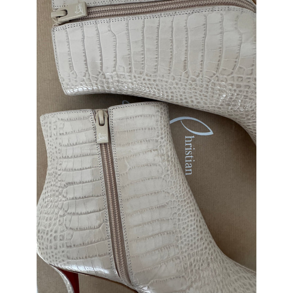 CHRISTIAN LOUBOUTIN
Snake-effect leather ankle boots BNIB 39.5