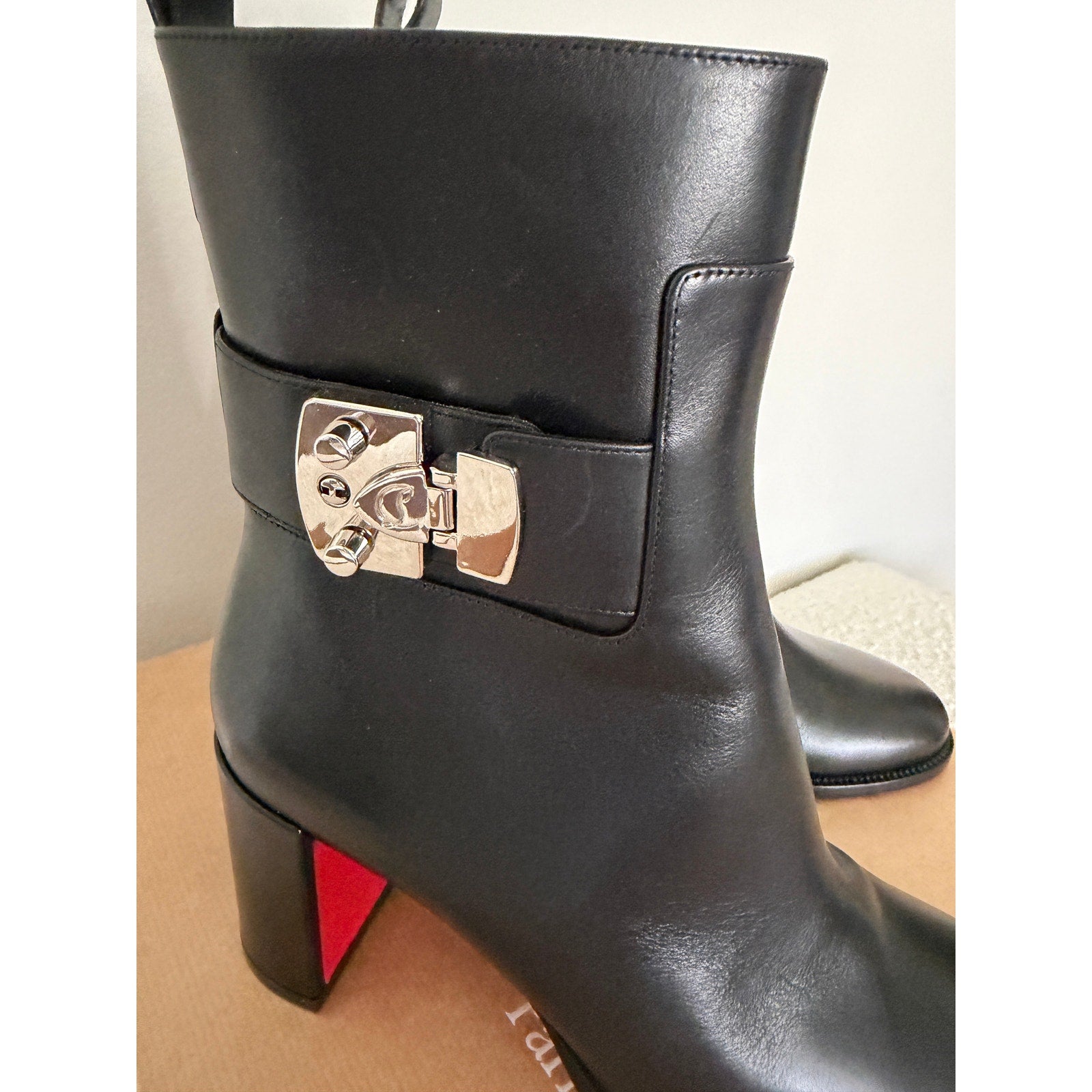 CHRISTIAN LOUBOUTIN
Booty Lock 70 leather ankle boots Size 37 NWT